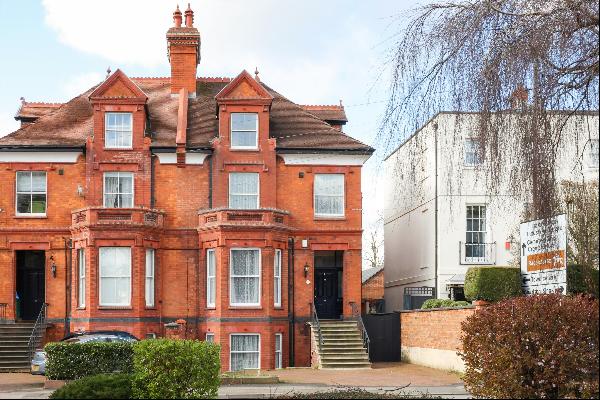 A substantial property with four apartments, parking and a central town location.