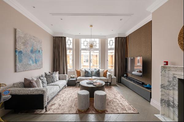 A newly designed family apartment in a sought-after red brick mansion block in Marylebone.