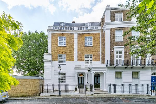 An exceptional townhouse on a charming private estate overlooking the private communal gar