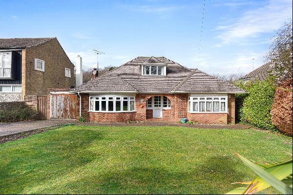 Chain free detached four-bedroom chalet style bungalow, situated in a west facing plot of 