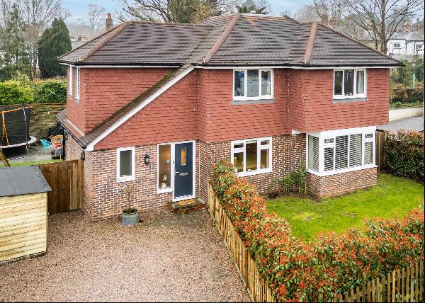 A detached four bedroom family home located in a gated and private road close to sought af