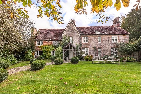 An exceptionally charming Grade II listed house dating back to 1450 surrounded by beautifu