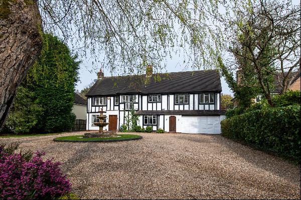 A stunning family home with extensive gardens in this sought-after location with a useful 