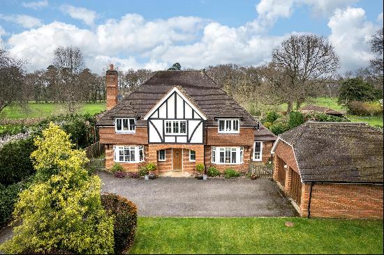 Backing onto the 7th fairway of Bramley Golf Course.