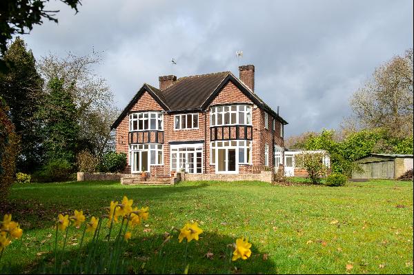 A detached family home in an elevated position, overlooking open countryside close to Keni