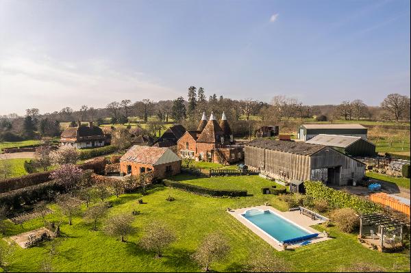 A rare opportunity to acquire an idyllic farm with far-reaching views over its own ring-fe