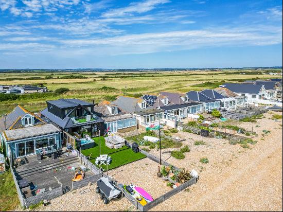 Fantastic detached house in a magnificent location on Pevensey Bay beach with stunning vie