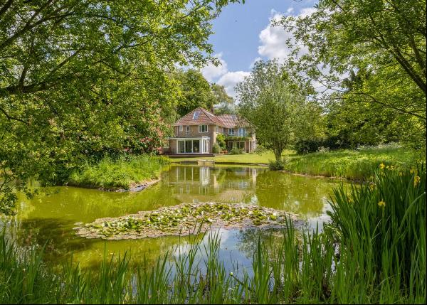 An extended former rectory in a private, peaceful setting with far-reaching views over the
