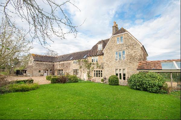 Set in a tranquil and private location, a beautiful period farmhouse and accompanying cott