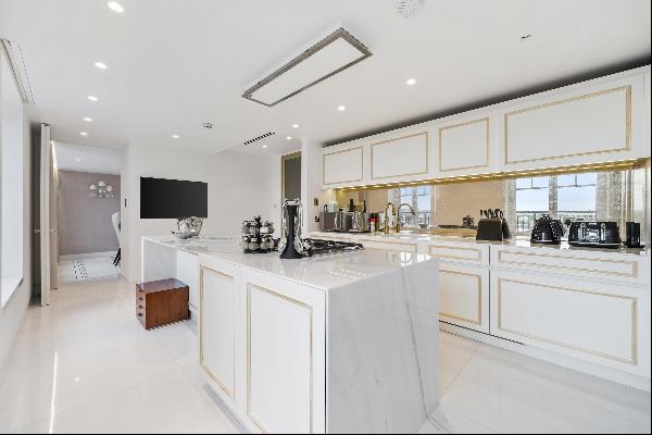 A spectacular three bedroom penthouse duplex apartment to rent in Kensington W8.