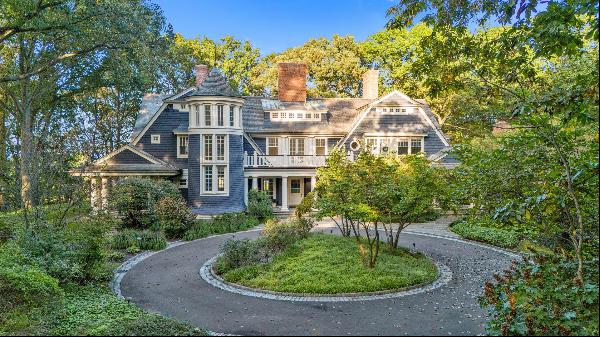 A one-of-a-kind compound centered on a magnificent shingle-style home designed by renowned