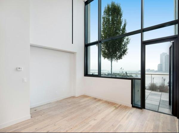 Sun-flooded dream apartment at the coveted Pierhouse at Brooklyn Bridge Park condominium.T