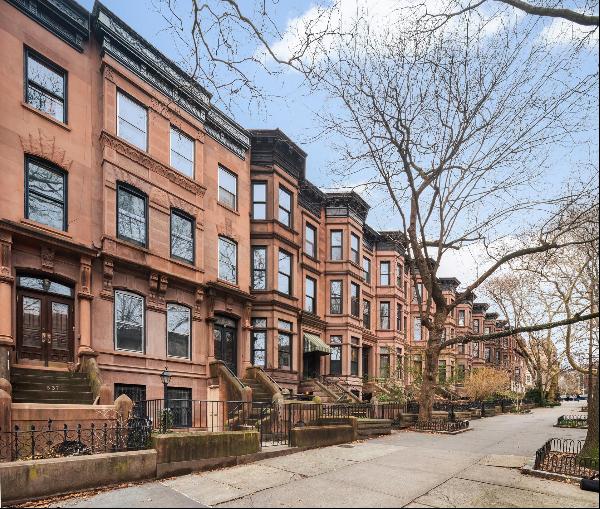 This prime Park Slope brownstone offers a blend of historic charm and modern comforts. Wit