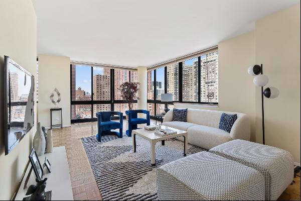 Perched high in the sky, Apt 22G is a 3 bedroom, 3 bath corner apartment that feels like a