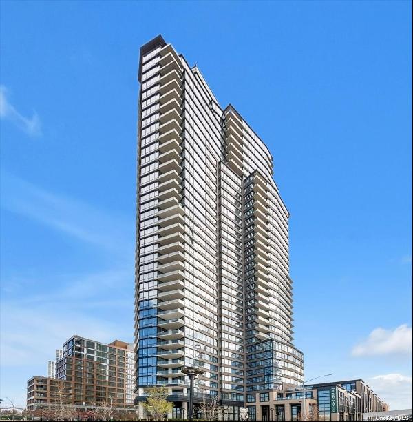 Welcome to Luxury Living at The Greenpoint! This 2-bedroom 2 bath condo provides unobstruc