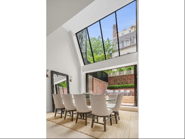 Magnificentlyrenovated 5-bedroom townhouse on one of the most sought after Upper East Side