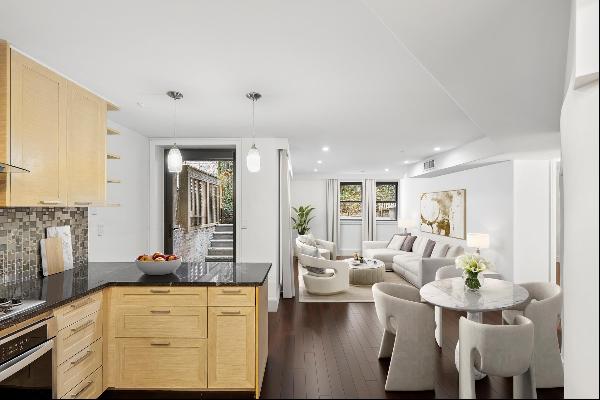 Welcome to #1B - Experience unparalleled luxury in this meticulously renovated triplex, fe