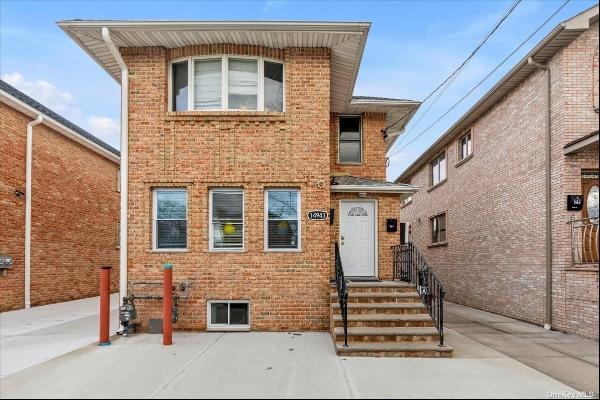 Welcome to this beautifully rebuilt Two Family in Whitestone. Brick home with party drivew