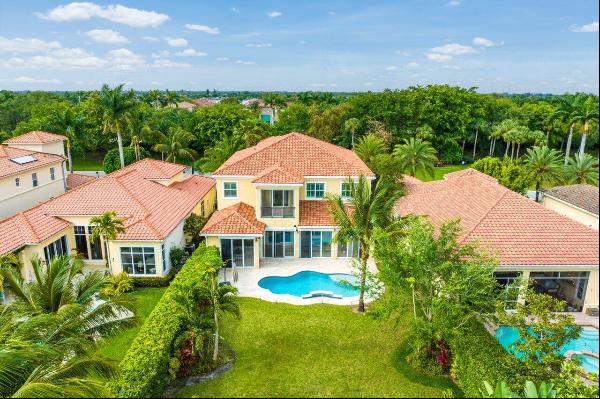 This exceptional six-bedroom estate is nestled on an oversized lot overlooking the golf co