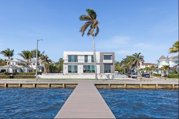 Brand new waterfront on Flagler Drive meets modern luxury. This trophy property is nearing