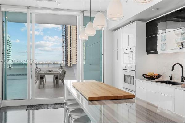 Discover unparalleled luxury living in this stunning 2 BD / 2 BA apartment in the heart of