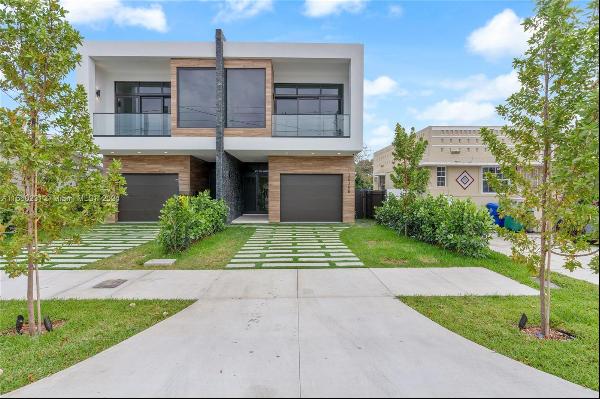 Experience modern luxury in this state-of-the-art 3 bed + home office/Den + 4 bath townhom