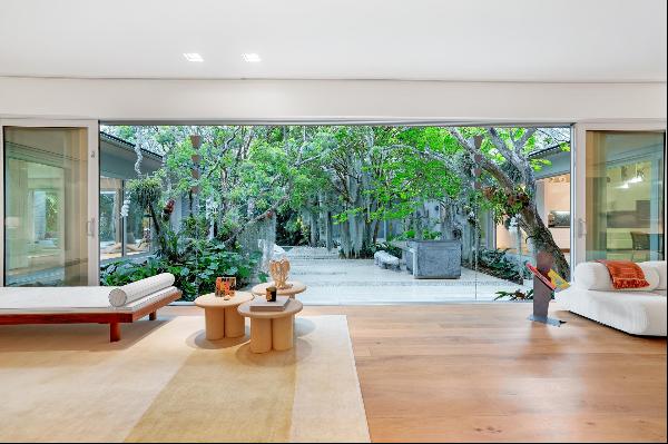 Step Inside With Me! This La Gorce Island Mid-Century Modern conveys a love of the arts, s