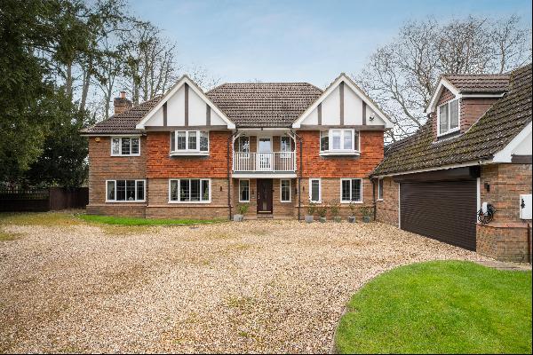 A substantial family home with 2.84 acres, located in a quiet, secluded position in Woking