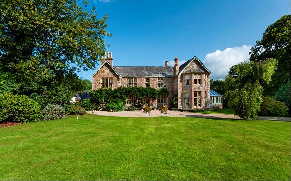 A superbly appointed family home with magnificent period features, magical gardens and two