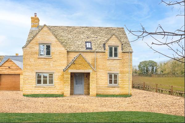 15 Saxon Fields is a beautifully designed 4 bedroom detached Cotswold stone home with a si