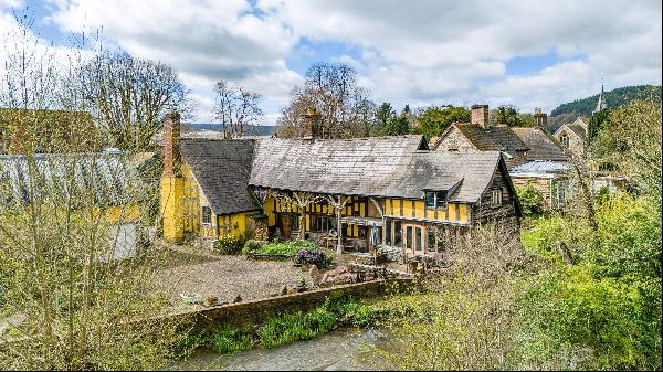 A Grade II listed village house of great character and charm set in delightful gardens and