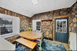 Privacy Awaits in this Charming Stone Colonial
