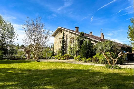 A 14TH CENTURY CHATEAU WITH A SWIMMING POOL AND AN ANNEX