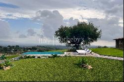 Panoramic stone farmhouse with olive groves and sea views