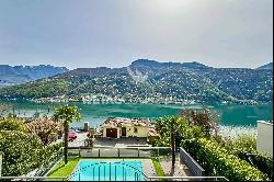 Enchanting lake view, swimming pool & garden: modern villa for sale in Vico Morcote