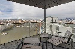 Striking riverside apartment in exclusive serviced residence with incredible cit