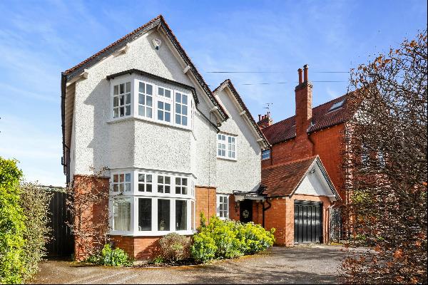 A delightful five-bedroom detached family home with large attractive garden and exceptiona