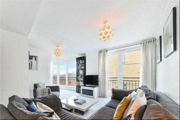 A split level two bedroom apartment in Keepier Wharf with a roof terrace and far reaching 