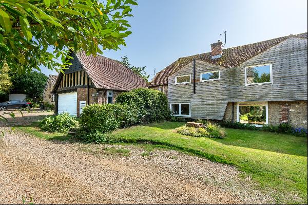 Nestled in the heart of a picturesque village, this converted barn offers versatile accomm