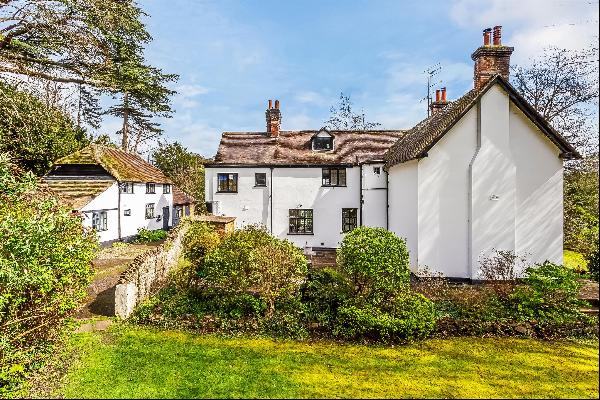 A stunning Grade II listed family home just over half a mile from Guildford’s historic Hig