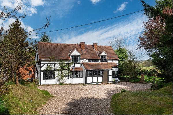 A delightful Grade II listed family home with separate annexe and 3.82 acres.