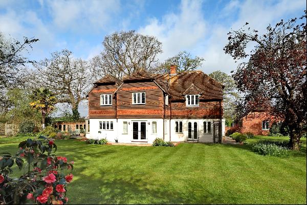 A charming five bedroom house with 2 acres, situated in an idyllic, countryside setting in
