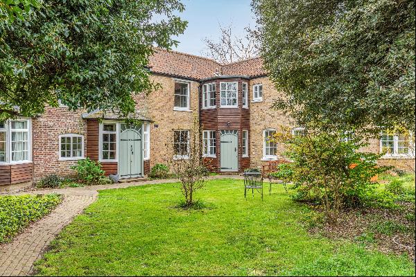 A wonderful period house which sits on an extraordinary plot measuring over a 1/3 of an ac