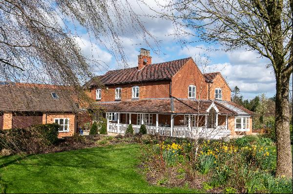 A beautifully appointed detached farmhouse situated in 1.44 acres with lovely countryside 