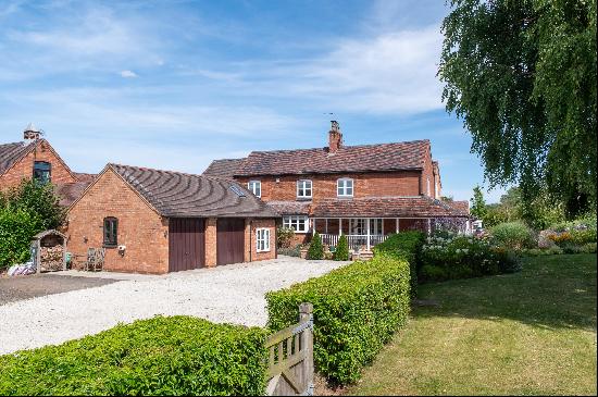 A beautifully appointed detached farmhouse situated in 1.44 acres with lovely countryside 