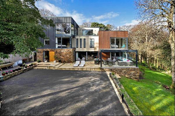 An exceptional contemporary family home with annex, privately positioned in one of the cou