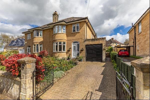 An attractive semi-detached family home in a desirable residential avenue convenient for W