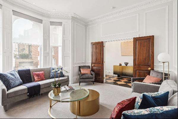 A superb apartment in Observatory Gardens, W8.