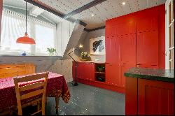 Very charming sunny canal apartment with rooftop terrace, elevator, and parking!