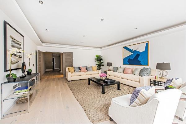 An expansive interior designed mid-terrace in Bishops Park with a fantastic rear garden, S
